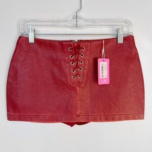 Edikted Lace Up Faux Leather Mini Skort in Bordeaux
